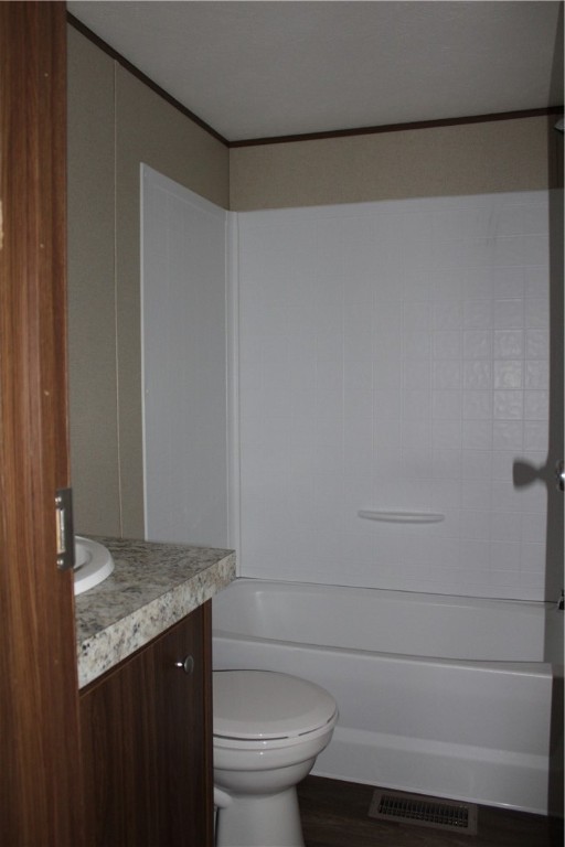 119 Royal Street Taylor, TX 76574 - Photo 17 of 18 a bathroom with a granite countertop sink and a toilet