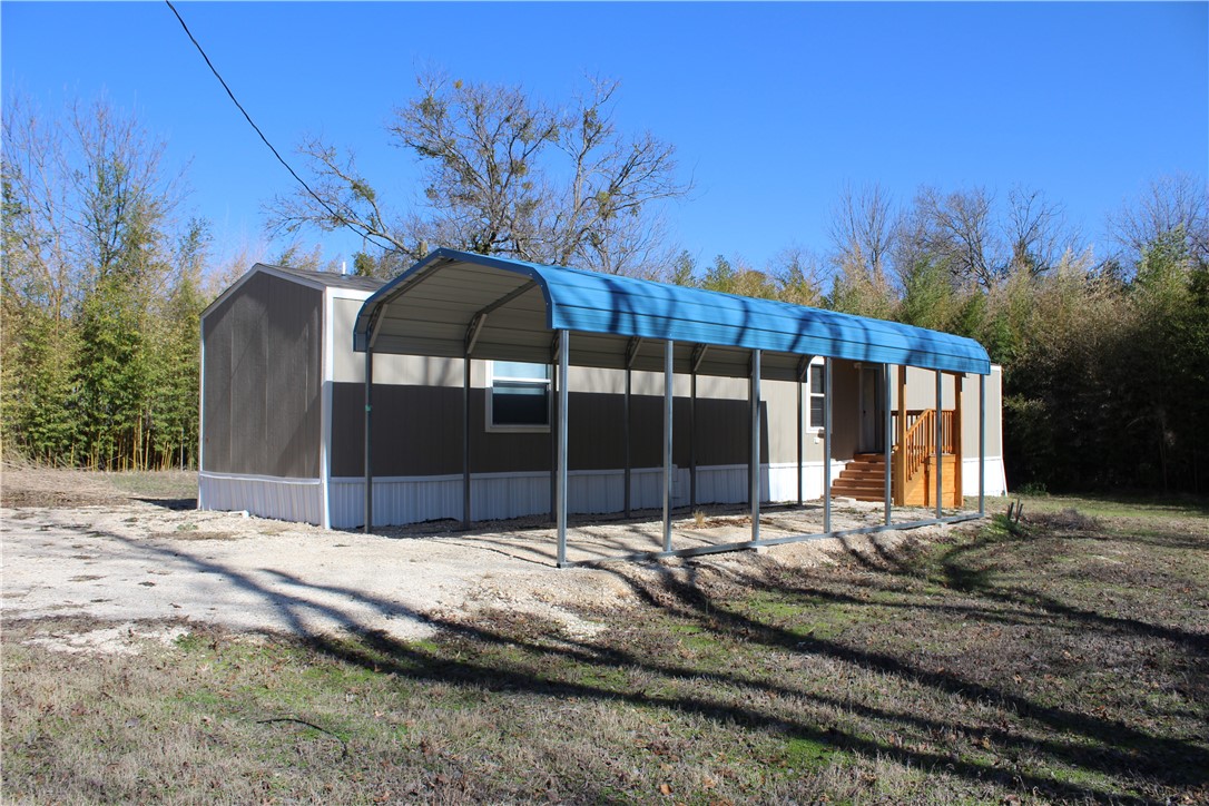 119 Royal Street Taylor, TX 76574 - Photo 3 of 18 a view of a backyard