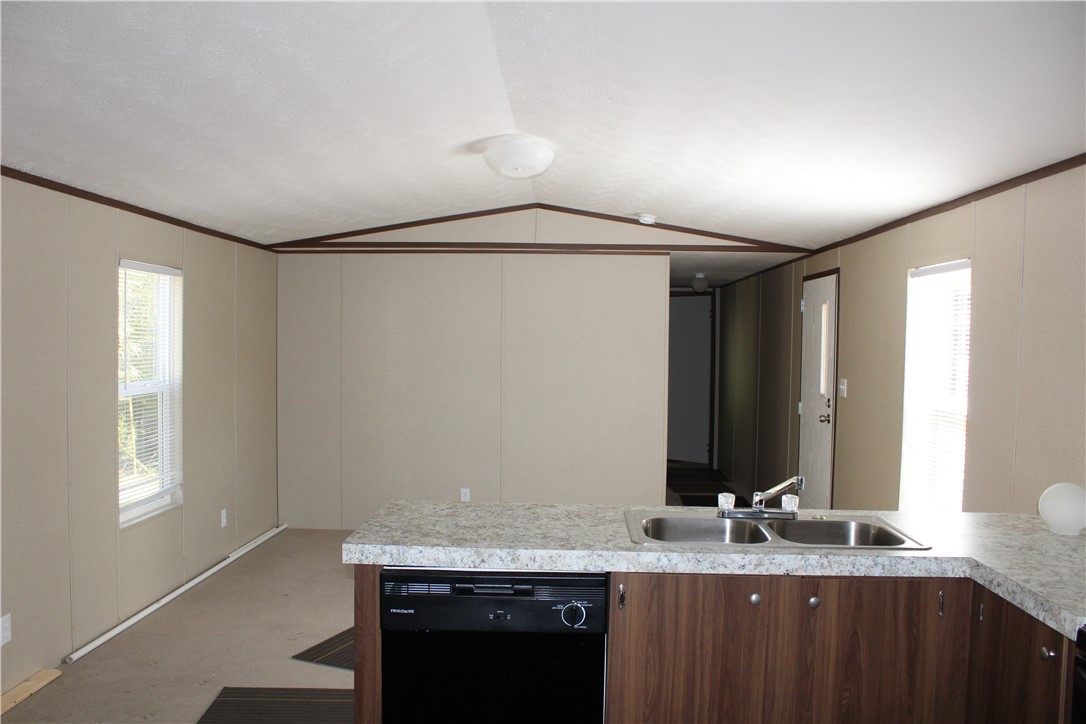 119 Royal Street Taylor, TX 76574 - Photo 5 of 18 a bathroom with a granite countertop sink and a mirror