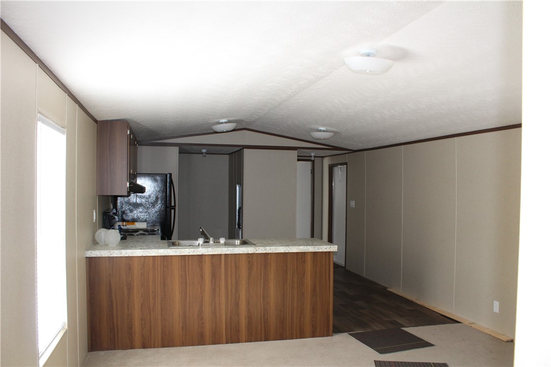 119 Royal Street Taylor, TX 76574 - Photo 7 of 18 a room with wooden door and entryway