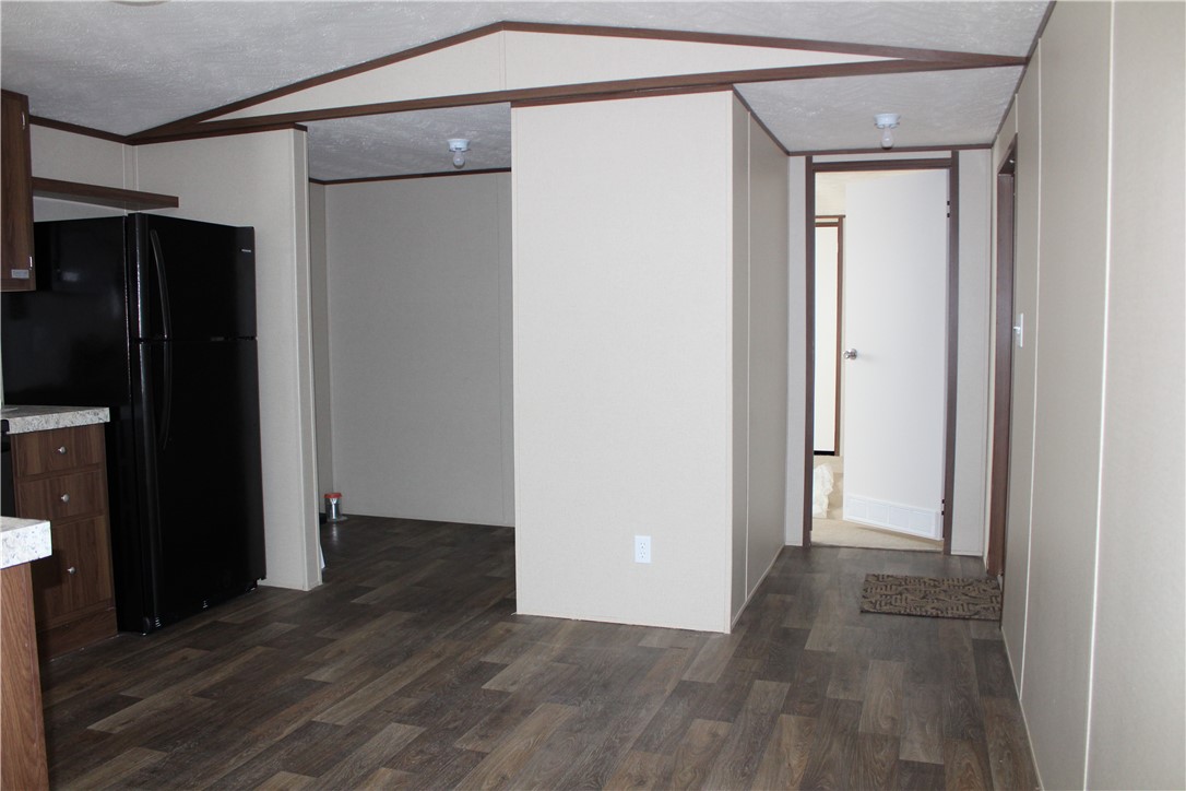 119 Royal Street Taylor, TX 76574 - Photo 9 of 18 a view of hallway with wooden floor