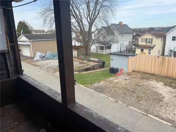 a view of a porch with a yard