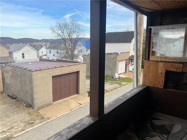 a view of a livingroom with furniture and window