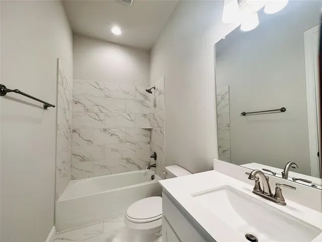 a view of storage and utility room with empty racks