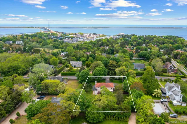 a view of a wooden deck with furniture