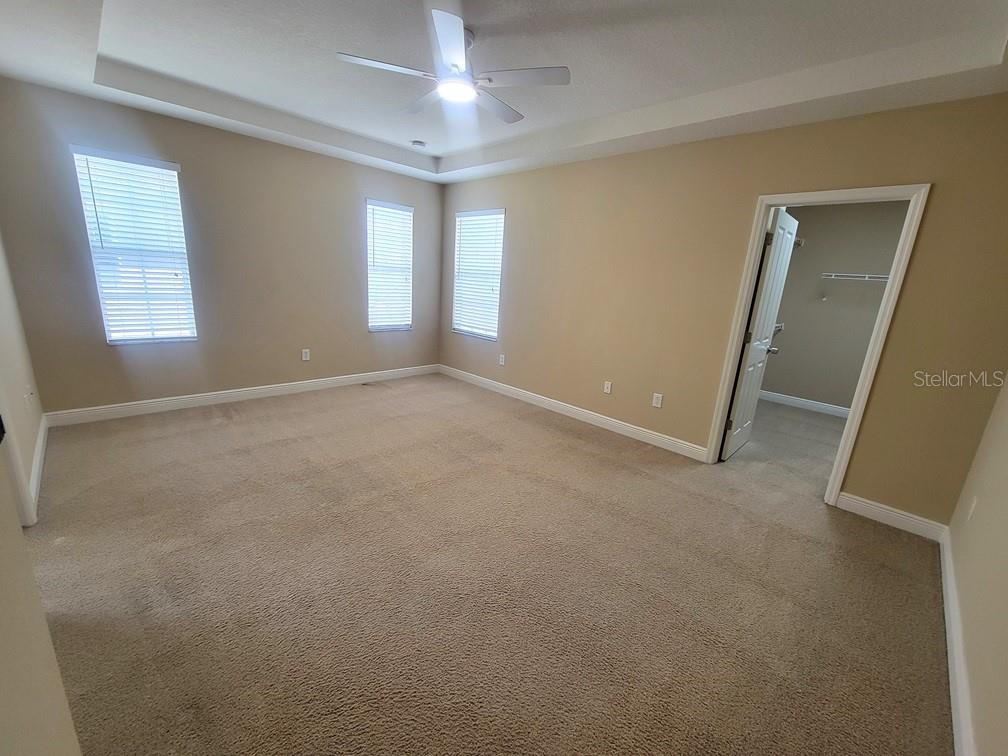 10418 Fenceline Road New Port Richey, FL 34655 - Photo 23 of 36 a view of an empty room with a window