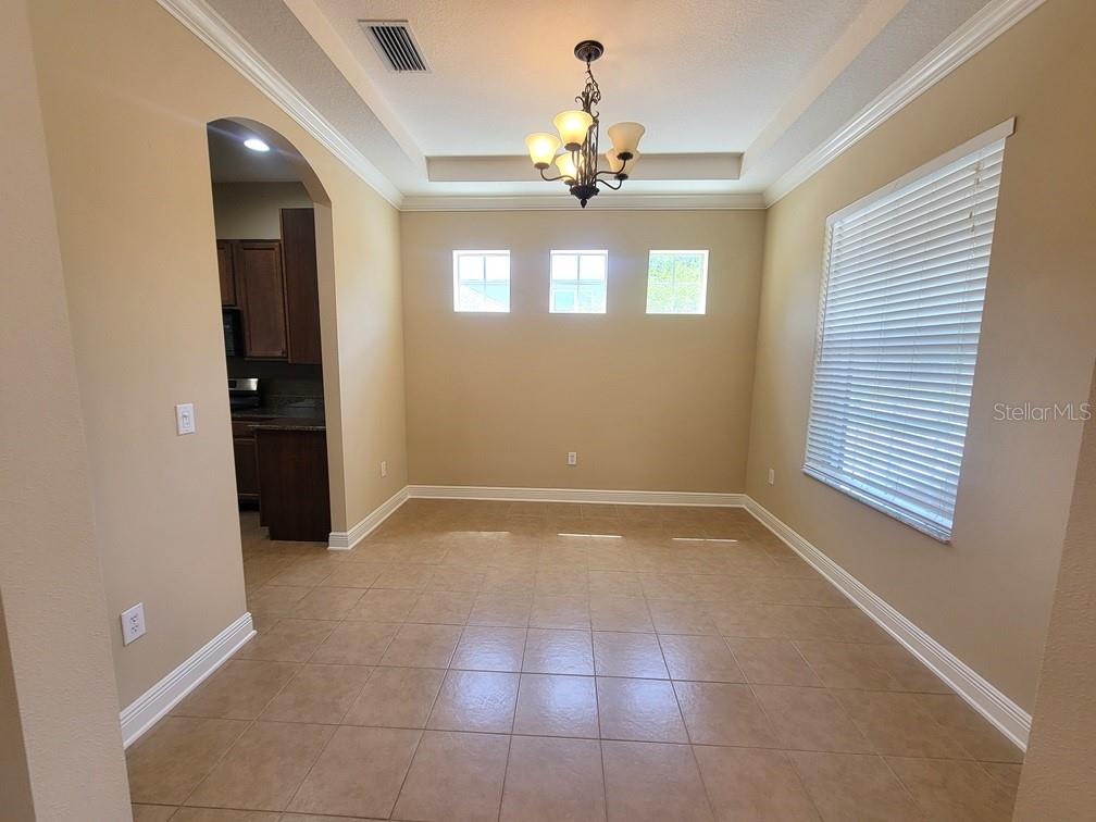 10418 Fenceline Road New Port Richey, FL 34655 - Photo 6 of 36 a view of an empty room with a window