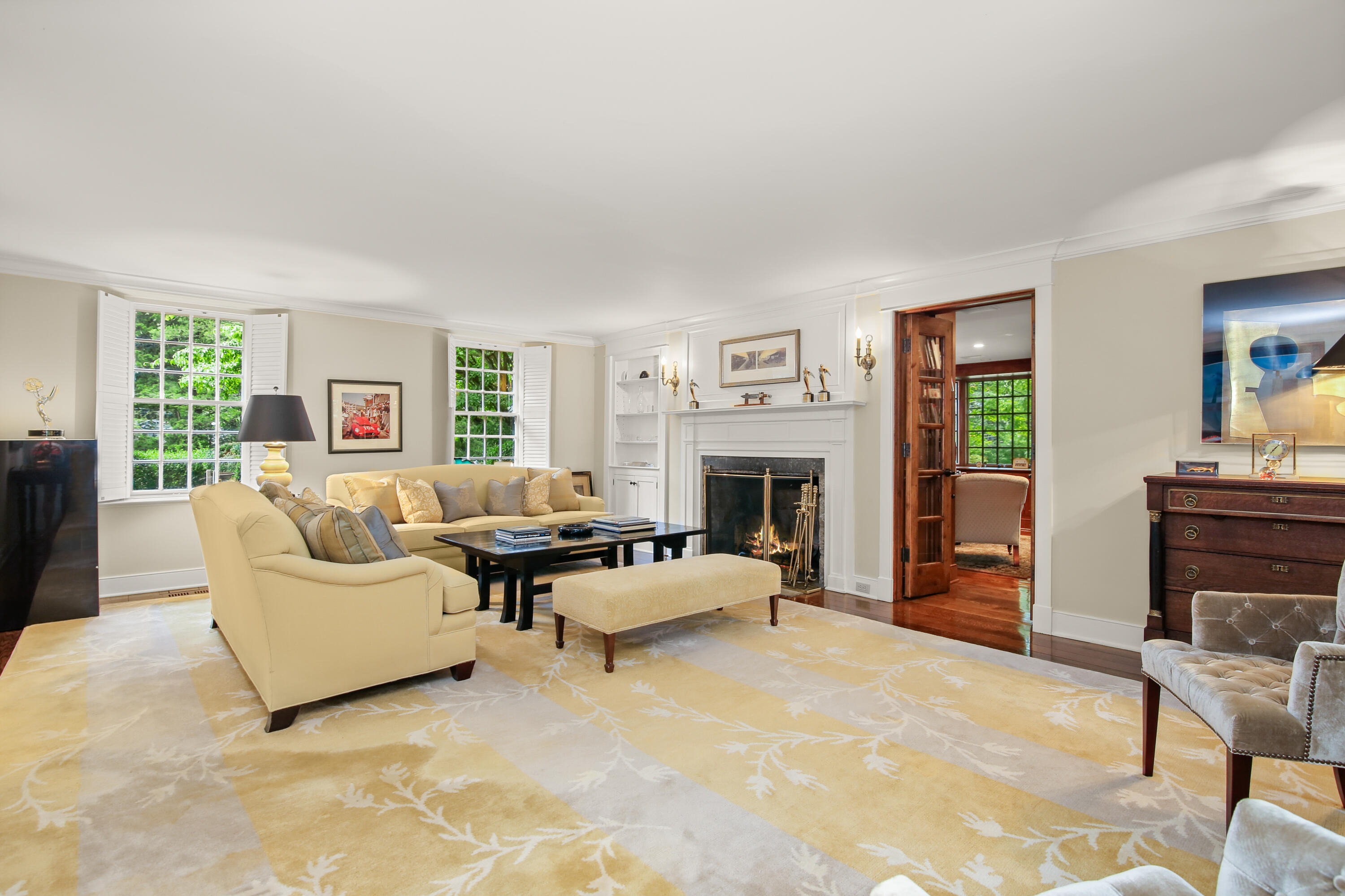 114 Ferris Hill Road New Canaan, CT 06840 - Photo 13 of 58 a living room with furniture and a fireplace