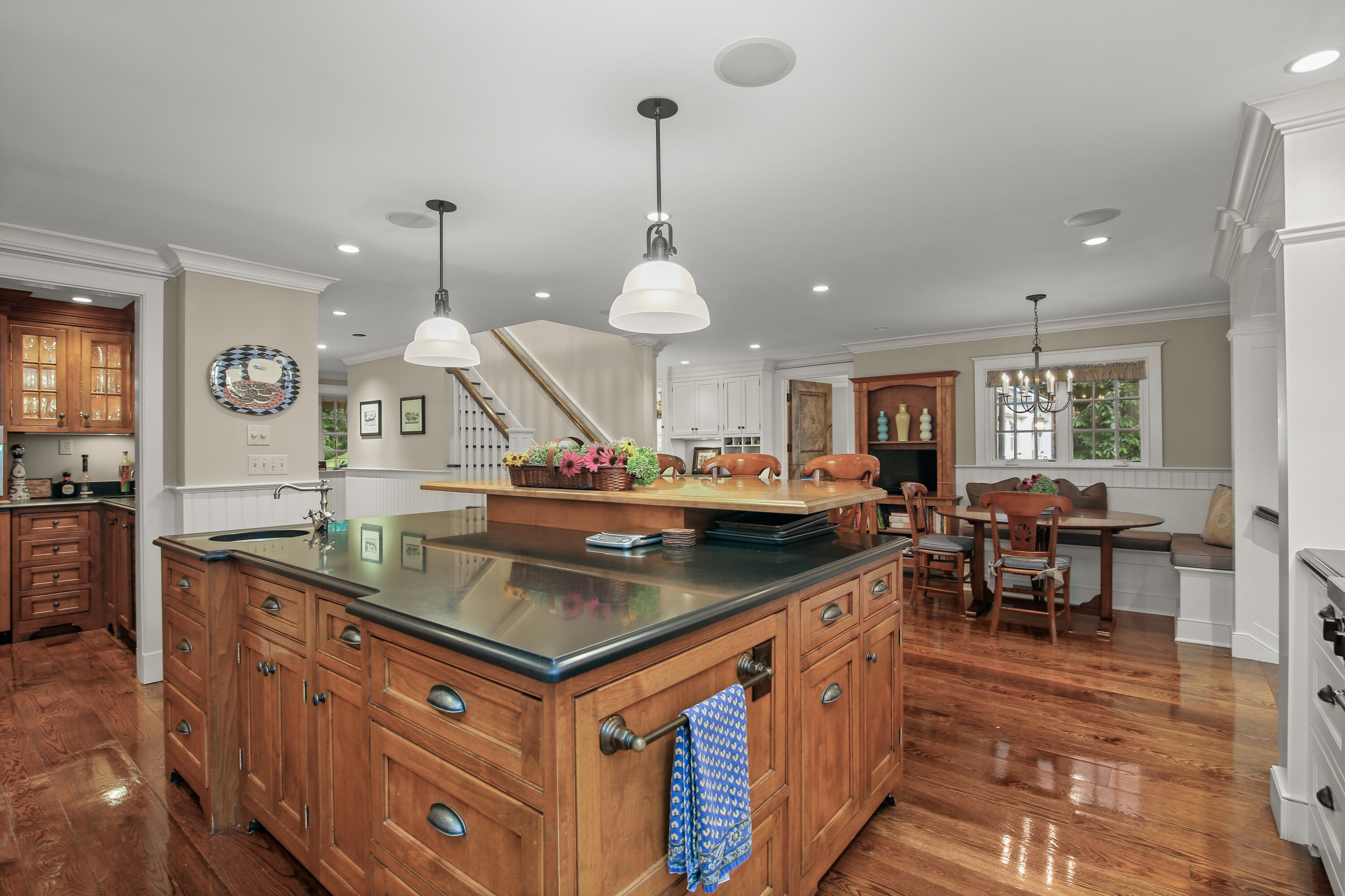 114 Ferris Hill Road New Canaan, CT 06840 - Photo 24 of 58 a kitchen with stainless steel appliances granite countertop a stove and a sink