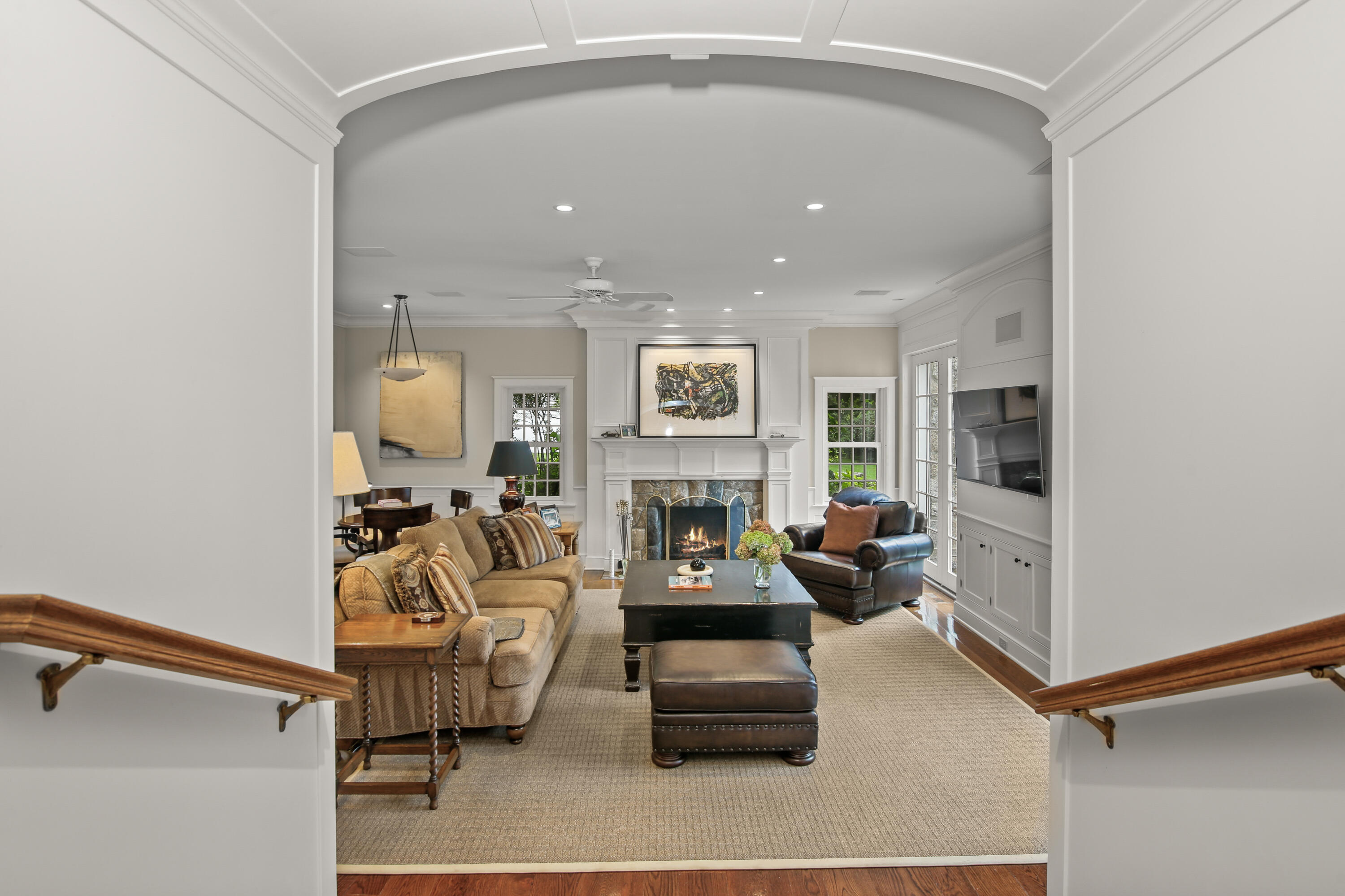 114 Ferris Hill Road New Canaan, CT 06840 - Photo 27 of 58 a living room with furniture and a fireplace