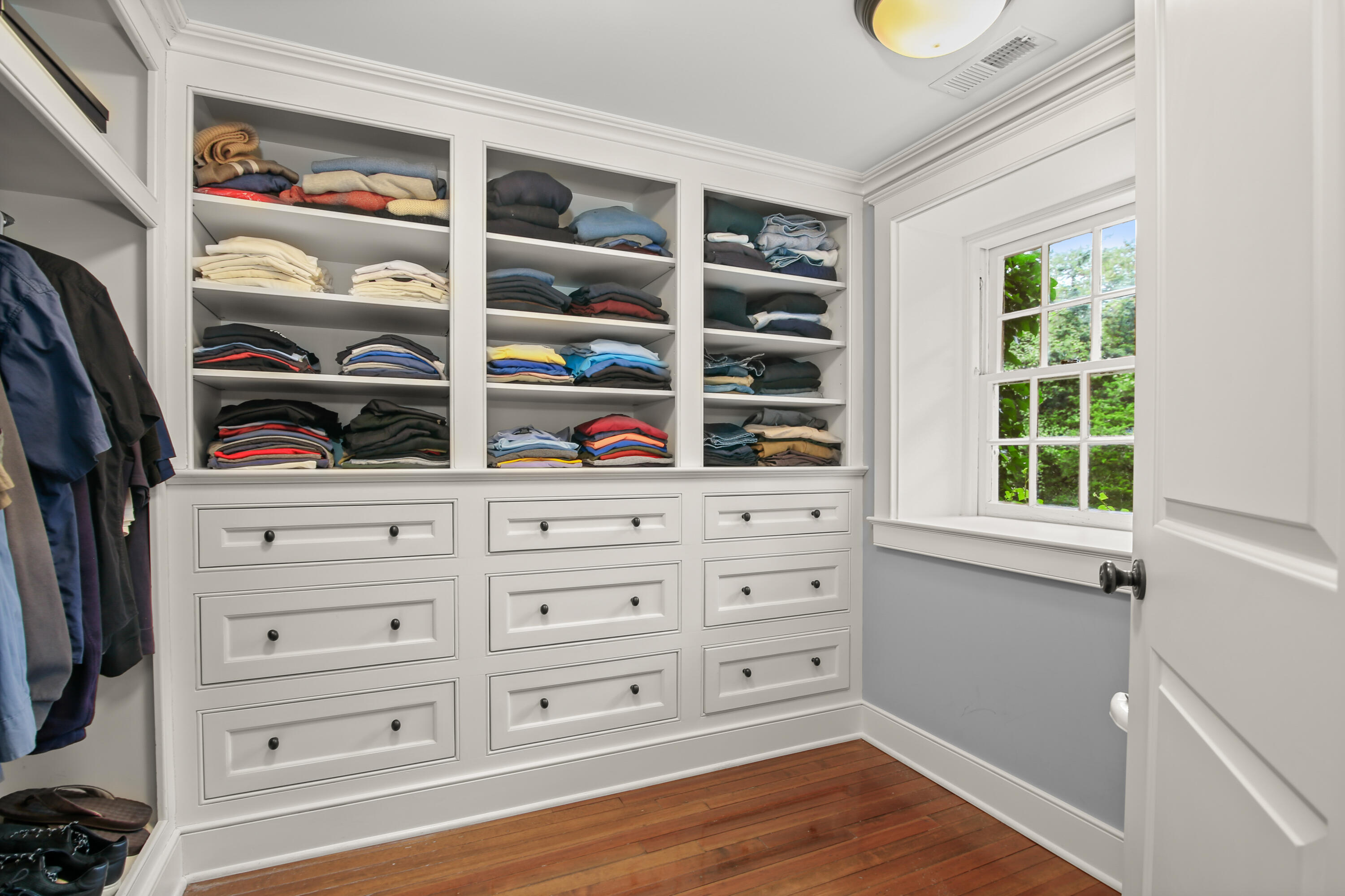 114 Ferris Hill Road New Canaan, CT 06840 - Photo 36 of 58 a view of walk in closet with clothes and shoes