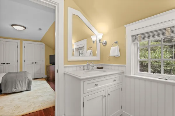 a picture of a bathroom with a sink