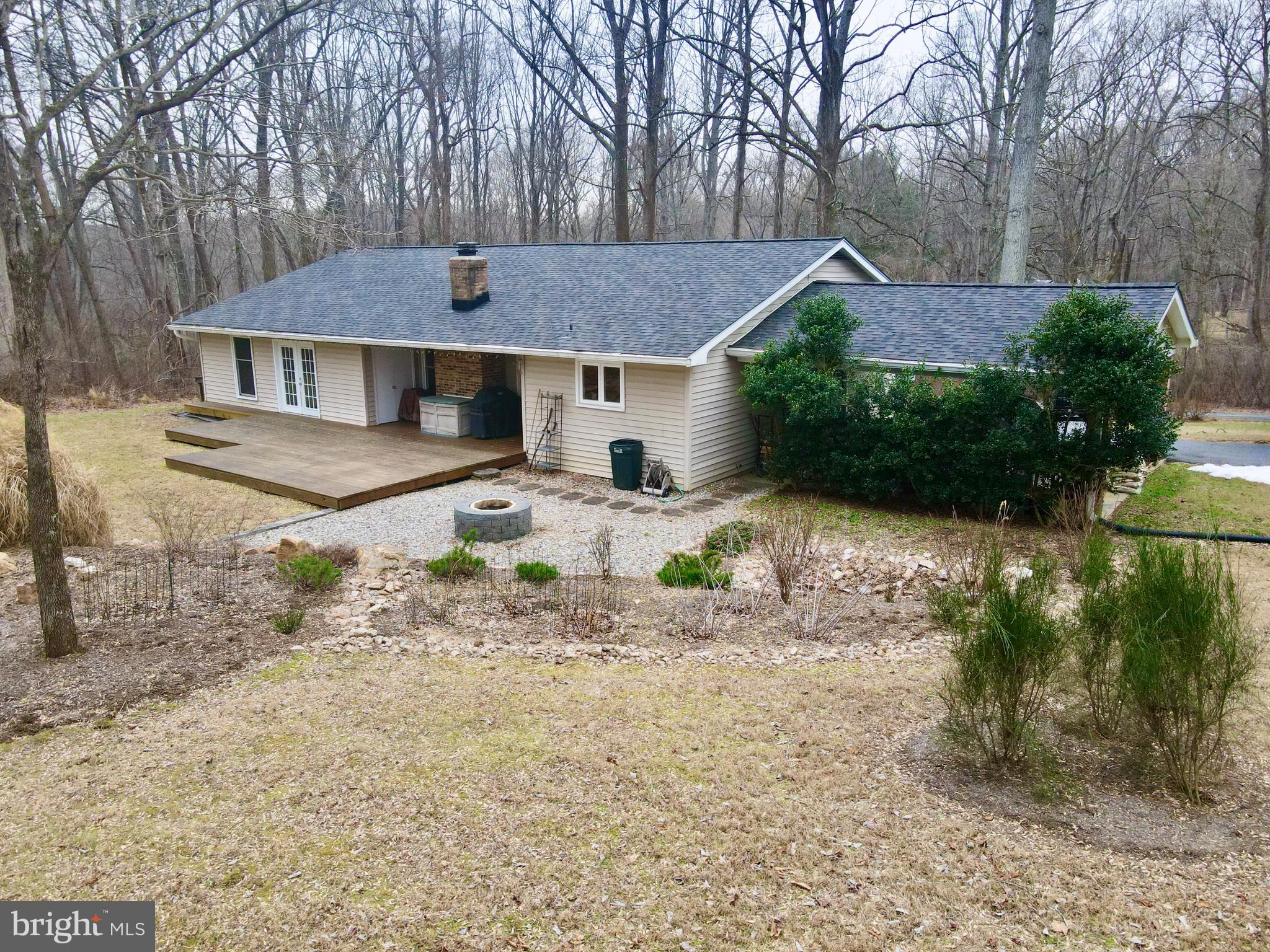 13040 Wainwright Road Highland, MD 20777 - Photo 3 of 34 a front view of a house with a yard