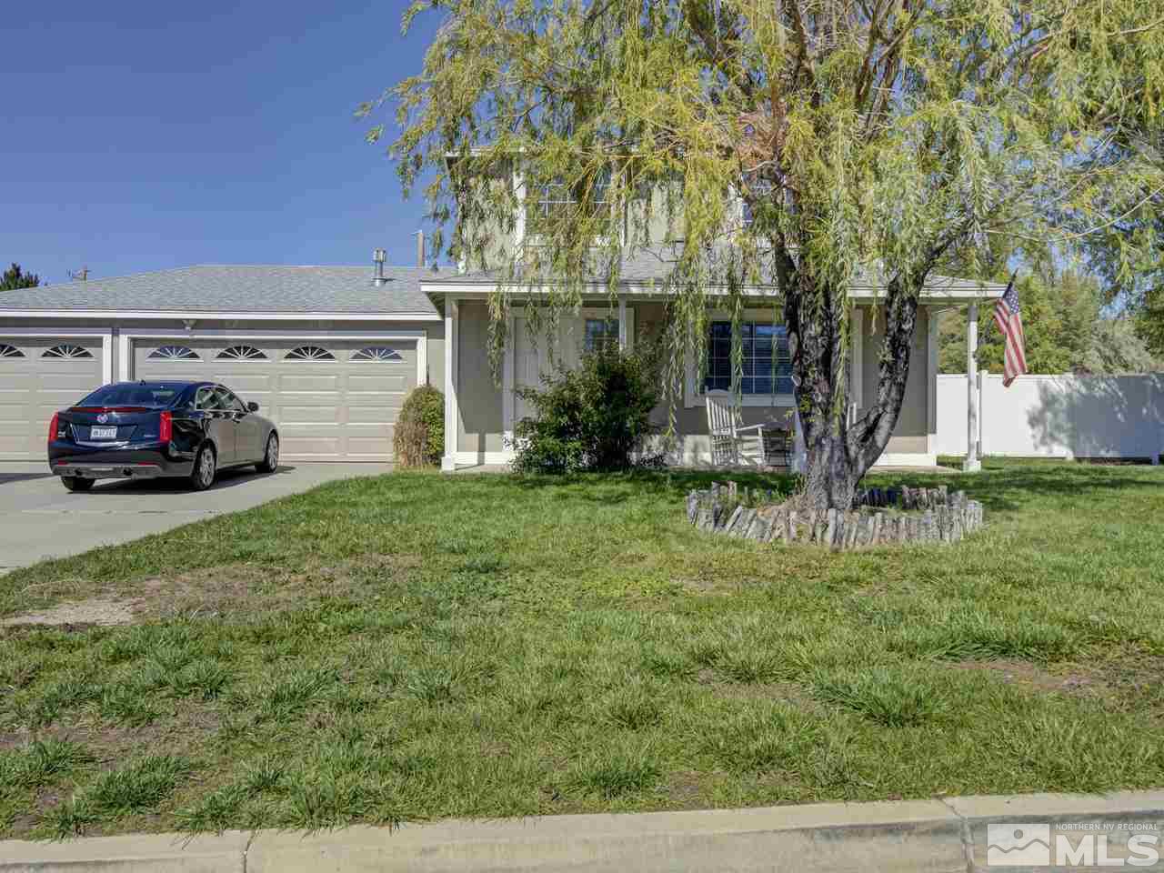17175 Waxwing Street Reno, NV 89508 - Photo 25 of 25 a front view of a house with garden