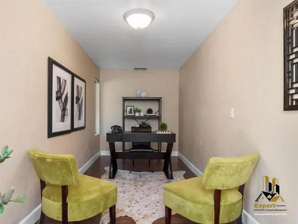 a view of a livingroom with furniture and a couch