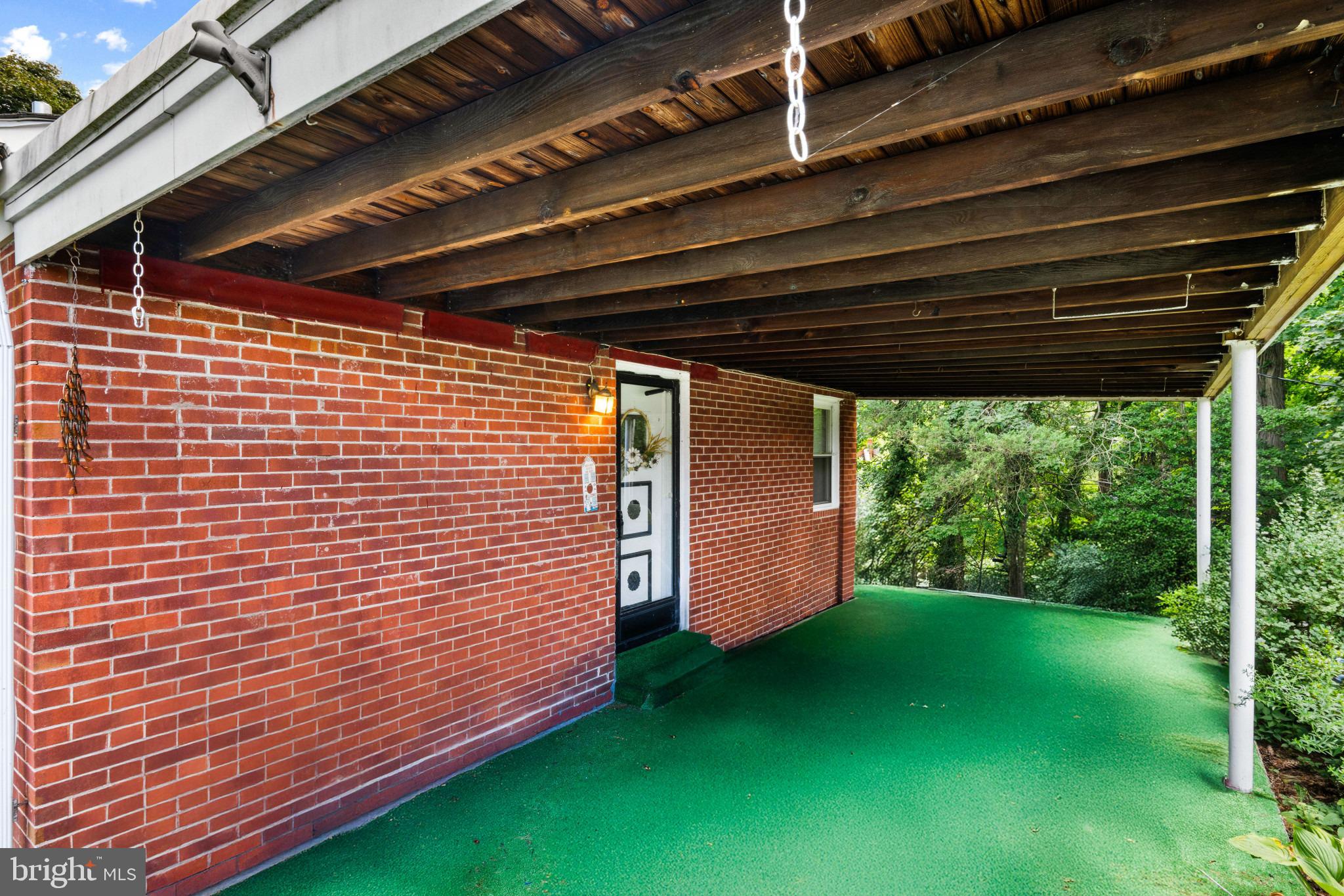410 Clinton Road Harrisburg, PA 17109 - Photo 23 of 28 Charming entryway beneath a rustic overhang.