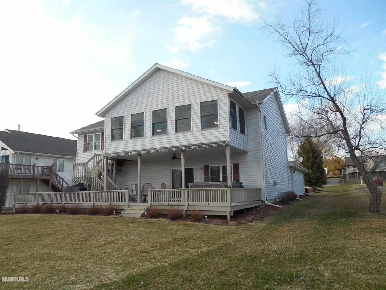 835 Breckenboro Road Davis, IL 61019 - Photo 24 of 24 a house view with a garden space