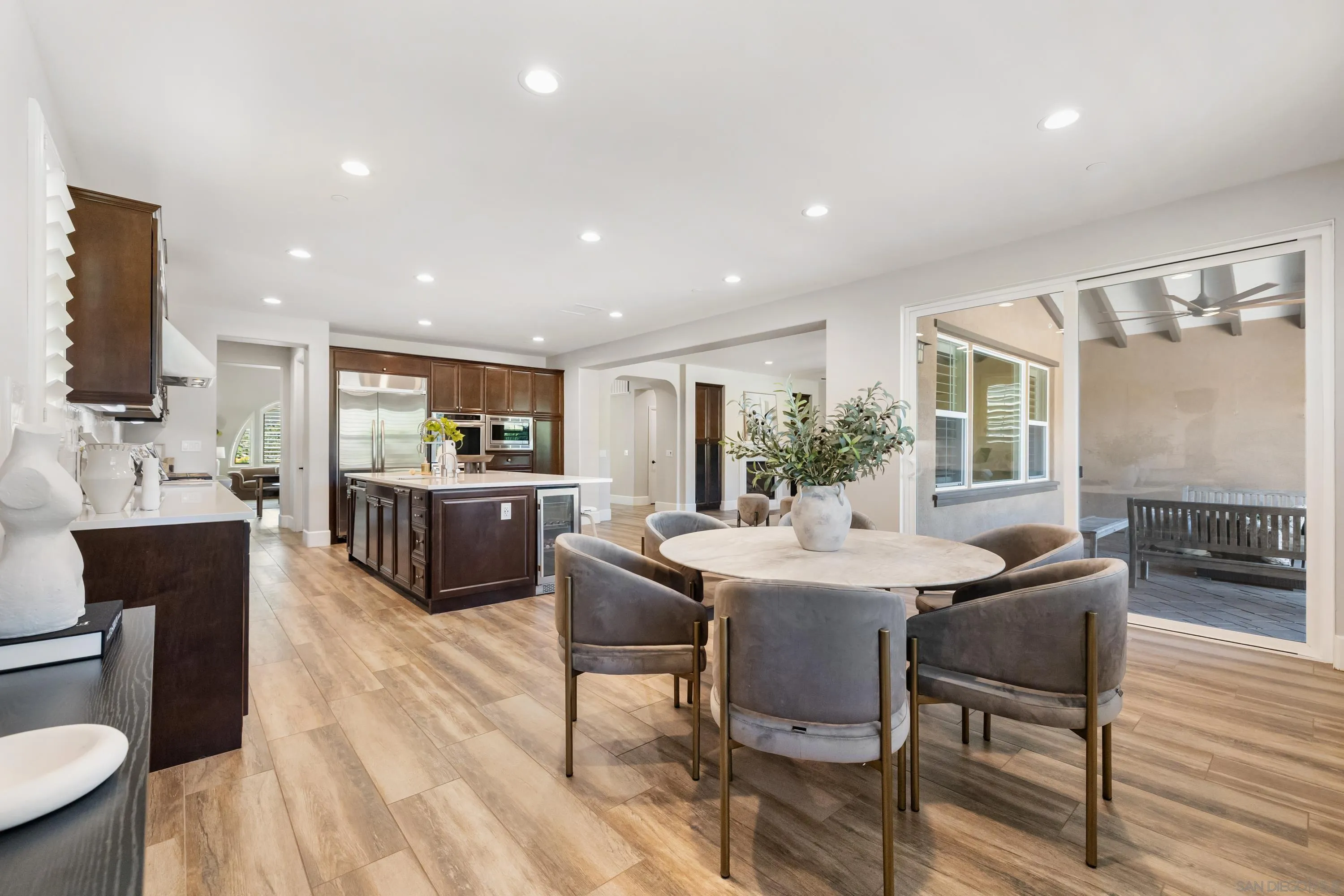 17848 Ralphs Ranch Road San Diego, CA 92127 - Photo 24 of 37 Dining area with views to kitchen and family room