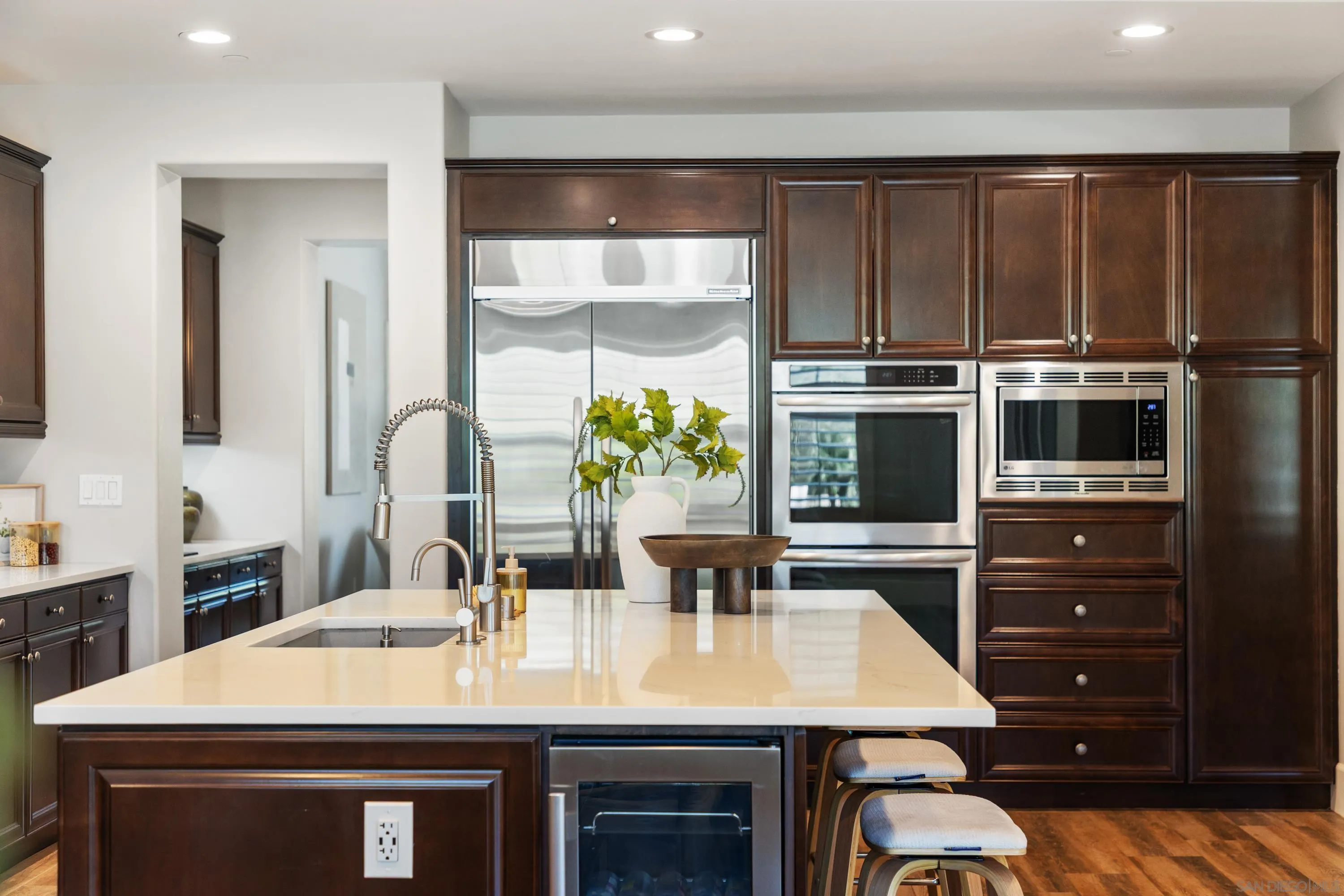 17848 Ralphs Ranch Road San Diego, CA 92127 - Photo 8 of 37 Dream kitchen w/high end appliances, built in fridge and beverage fridge