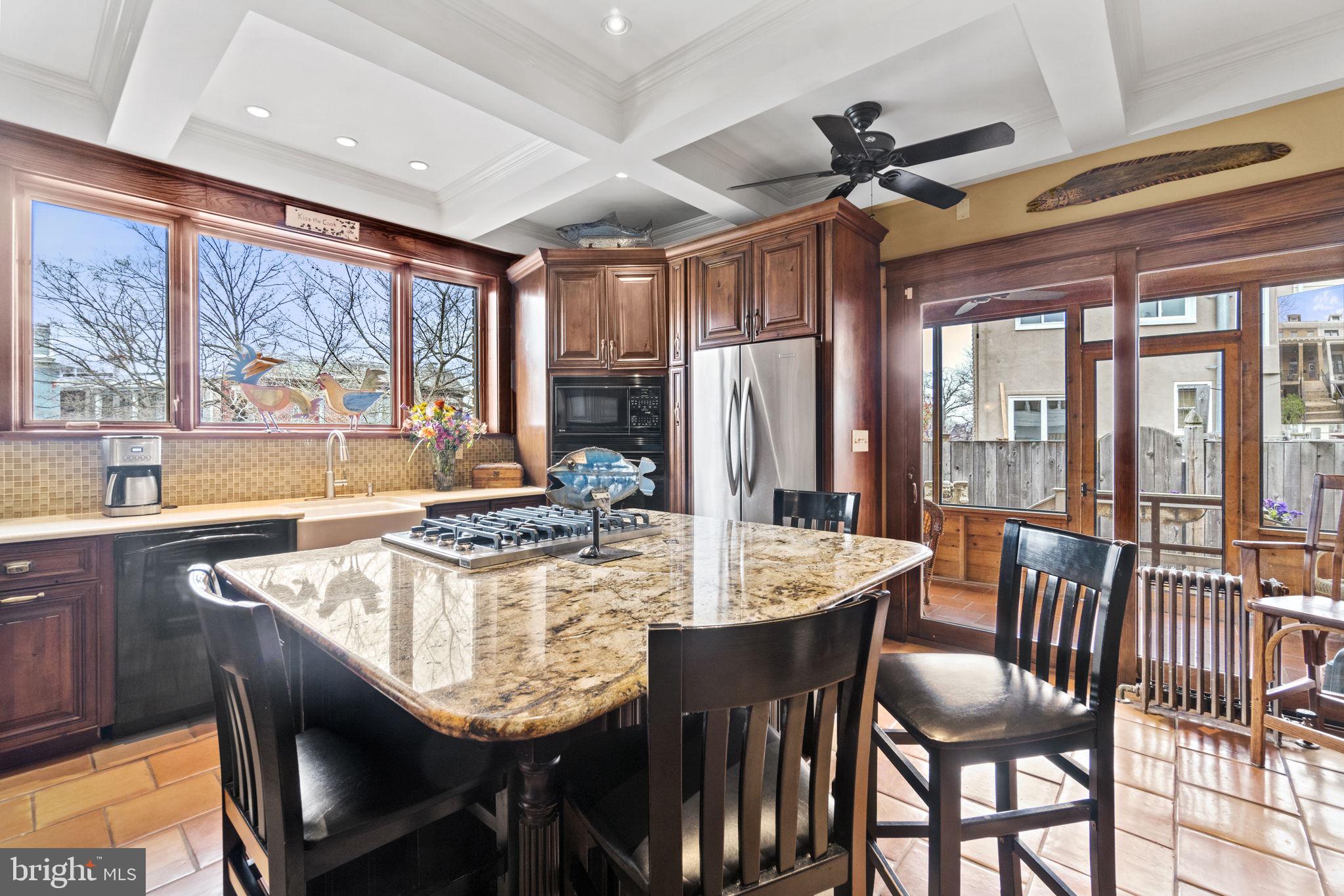 1100 E Street Northeast Washington, DC 20002 - Photo 22 of 66 The kitchen offers cofferd ceilings, fans cooktop