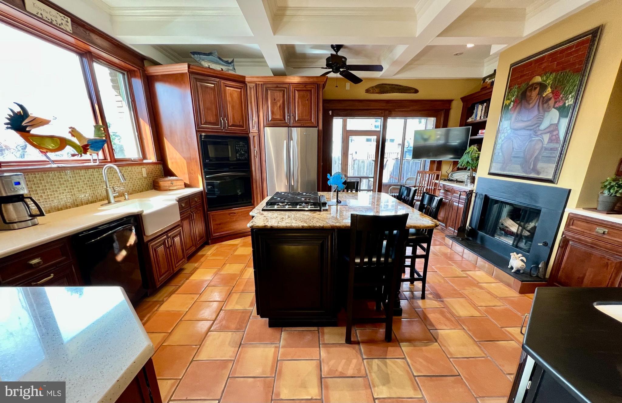 1100 E Street Northeast Washington, DC 20002 - Photo 24 of 66 Island chairs, a fireplace, , a conveying TV