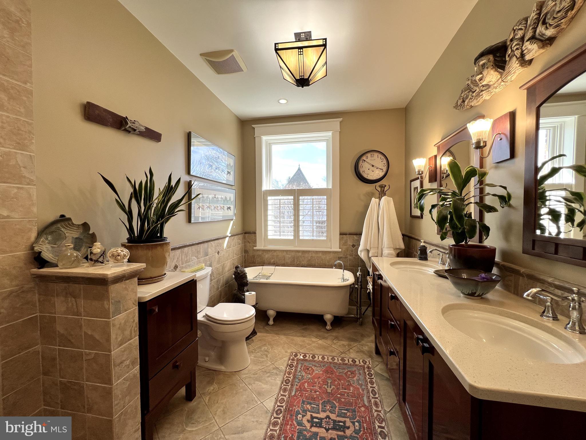 1100 E Street Northeast Washington, DC 20002 - Photo 37 of 66 A desirable bath, with a claw, double sink &shower