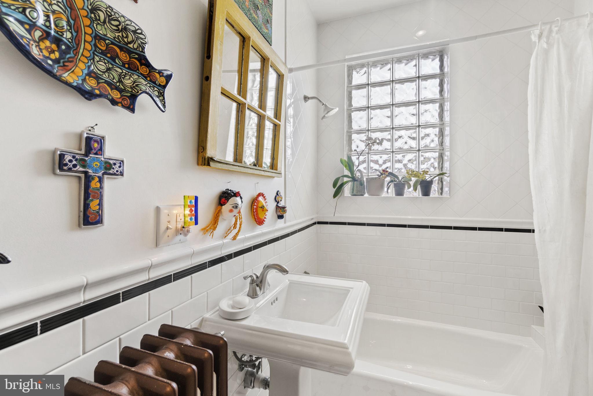 1100 E Street Northeast Washington, DC 20002 - Photo 46 of 66 Guest bath w/laundry & W/D