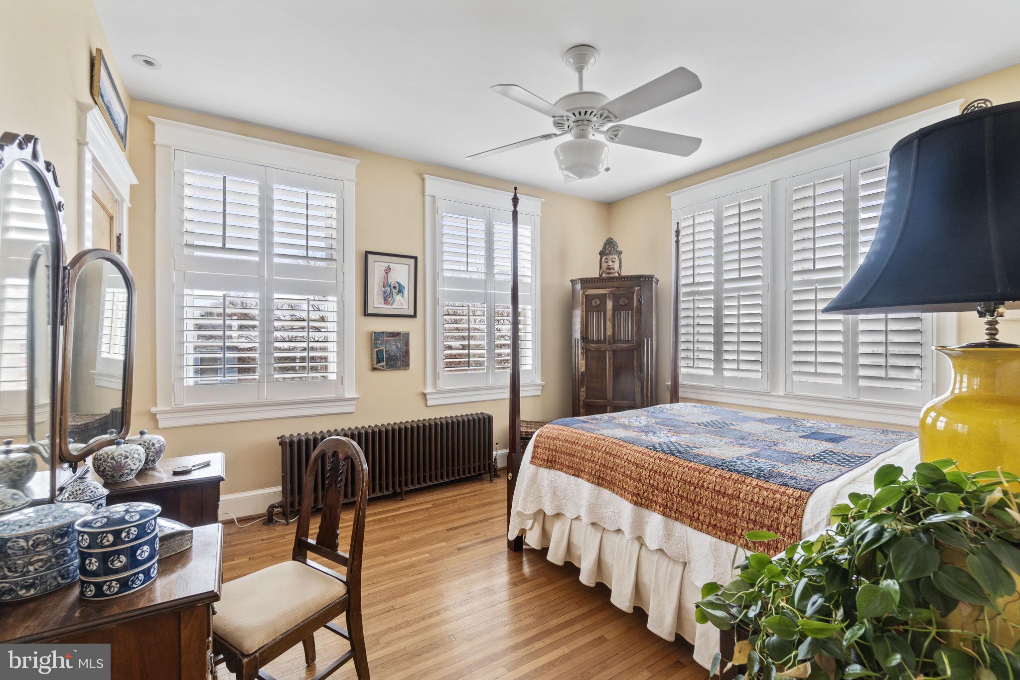 1100 E Street Northeast Washington, DC 20002 - Photo 47 of 66 West & North windows offer a cheerful guest BR