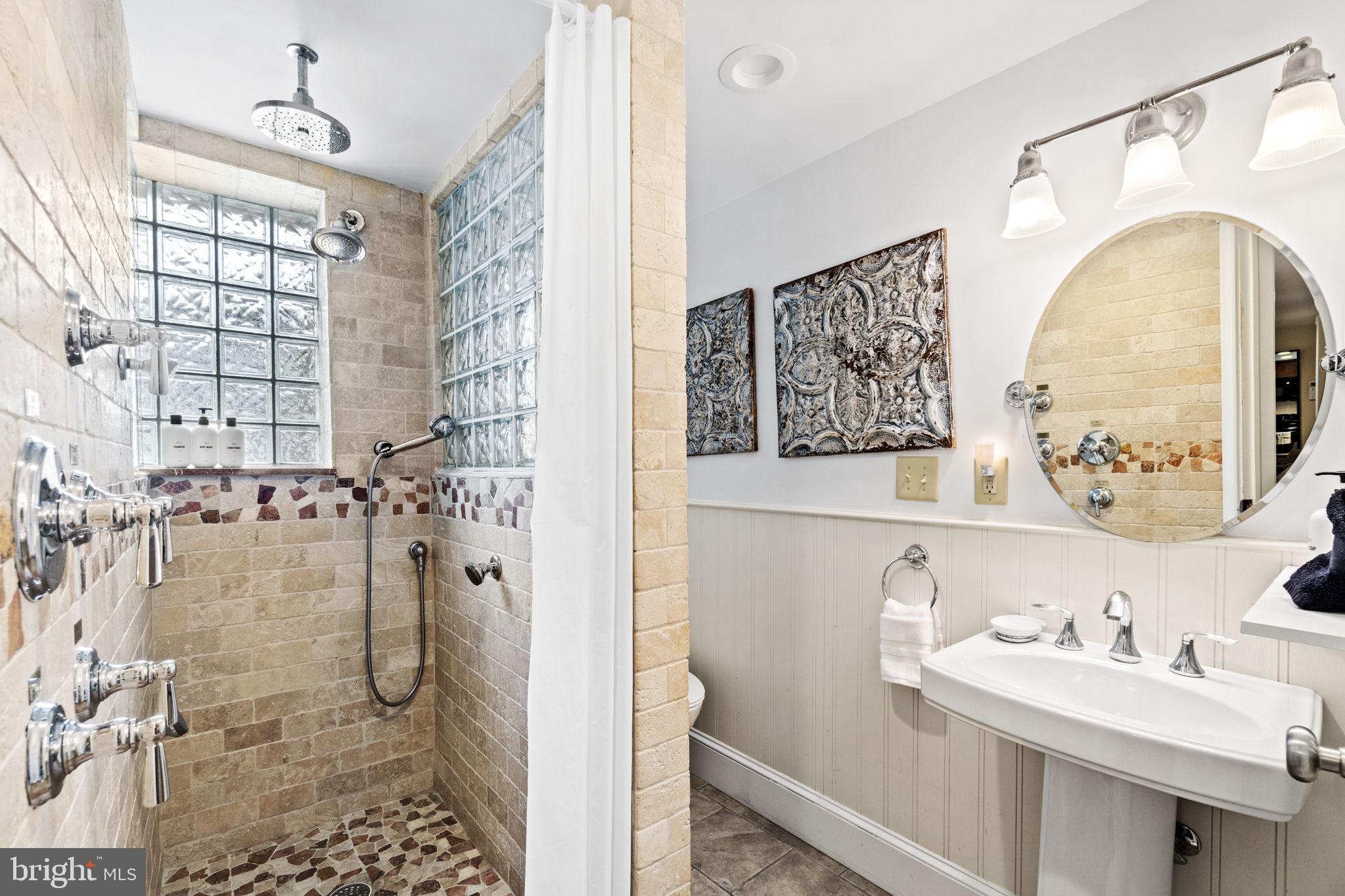 1100 E Street Northeast Washington, DC 20002 - Photo 57 of 66 Tintillating shower has multi sprayer heads!