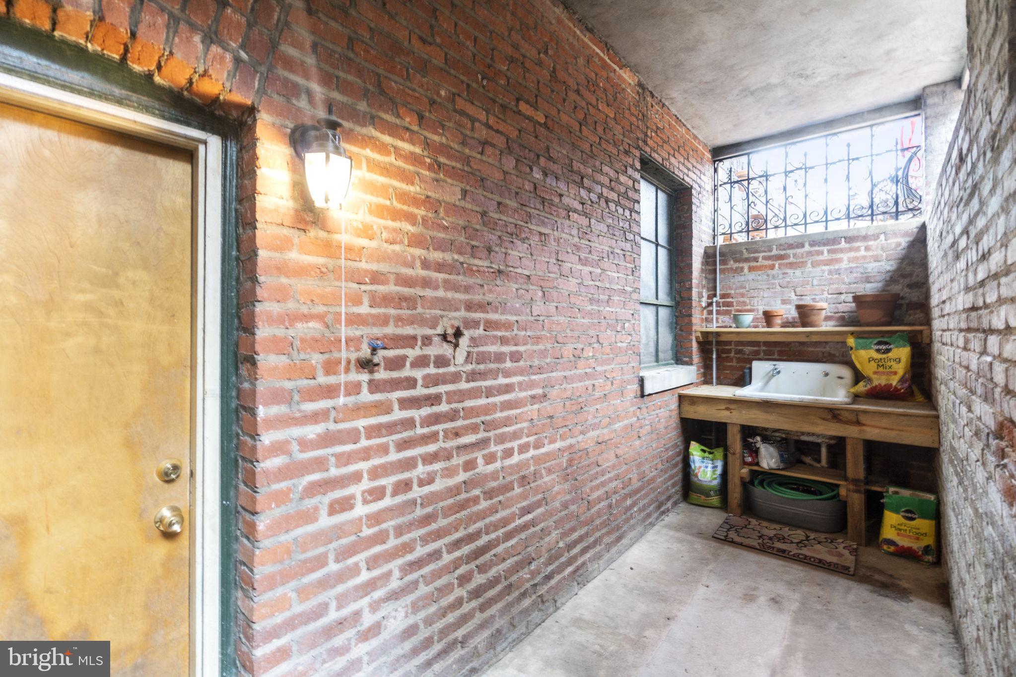 1100 E Street Northeast Washington, DC 20002 - Photo 63 of 66 Deep well offers water & space for garden acts