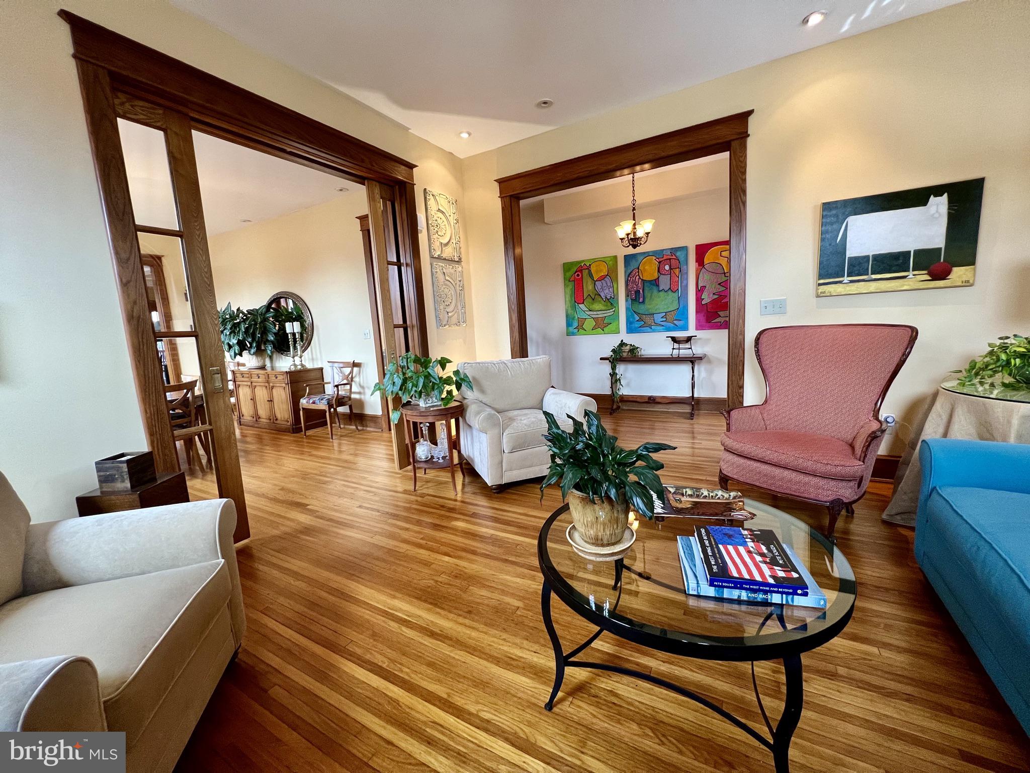 1100 E Street Northeast Washington, DC 20002 - Photo 9 of 66 Glass pane pocket door transitions to dining room