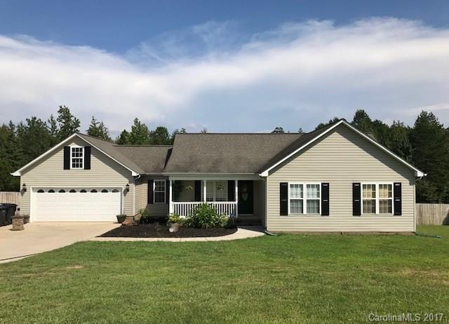 3510 Mack Ballard Road, Unit 13 Maiden, NC 28650 - Photo 1 of 24 a front view of a house with a garden