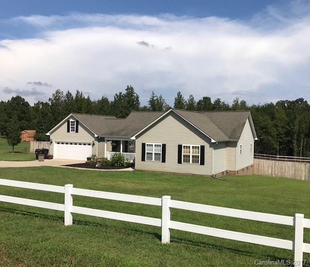 3510 Mack Ballard Road, Unit 13 Maiden, NC 28650 - Photo 2 of 24 a front view of a house with a yard