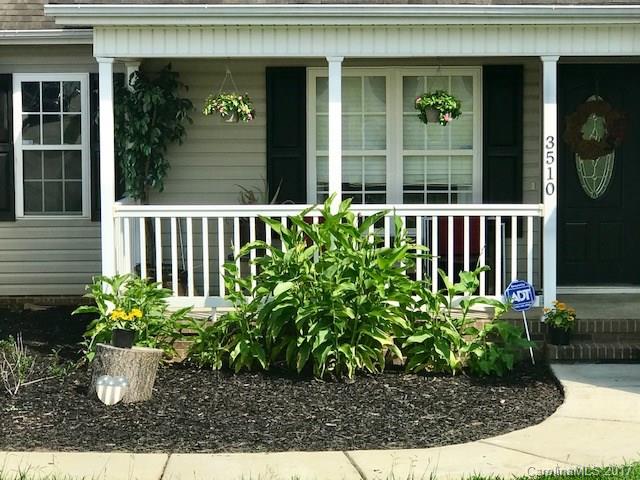 3510 Mack Ballard Road, Unit 13 Maiden, NC 28650 - Photo 3 of 24 a view of a porch with a bench