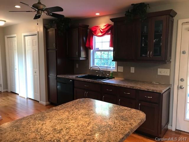 3510 Mack Ballard Road, Unit 13 Maiden, NC 28650 - Photo 4 of 24 a kitchen with a sink stove and refrigerator