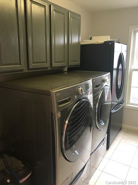 3510 Mack Ballard Road, Unit 13 Maiden, NC 28650 - Photo 9 of 24 a utility room with dryer and washer
