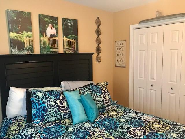 3510 Mack Ballard Road, Unit 13 Maiden, NC 28650 - Photo 10 of 24 a bedroom with a bed and a window