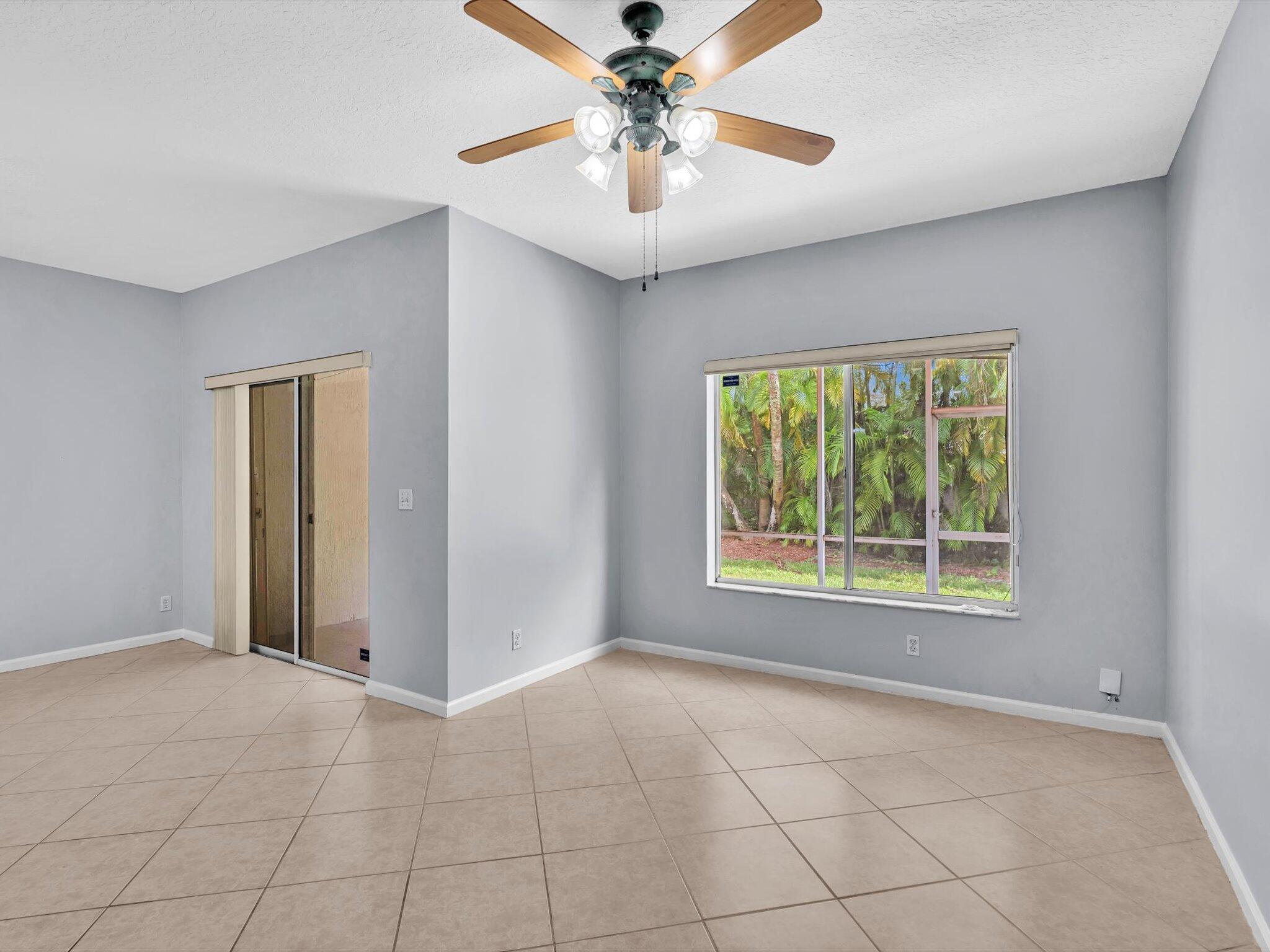 21018 Vía Eden, Unit 21018 Boca Raton, FL 33433 - Photo 13 of 63 a view of an empty room with a window