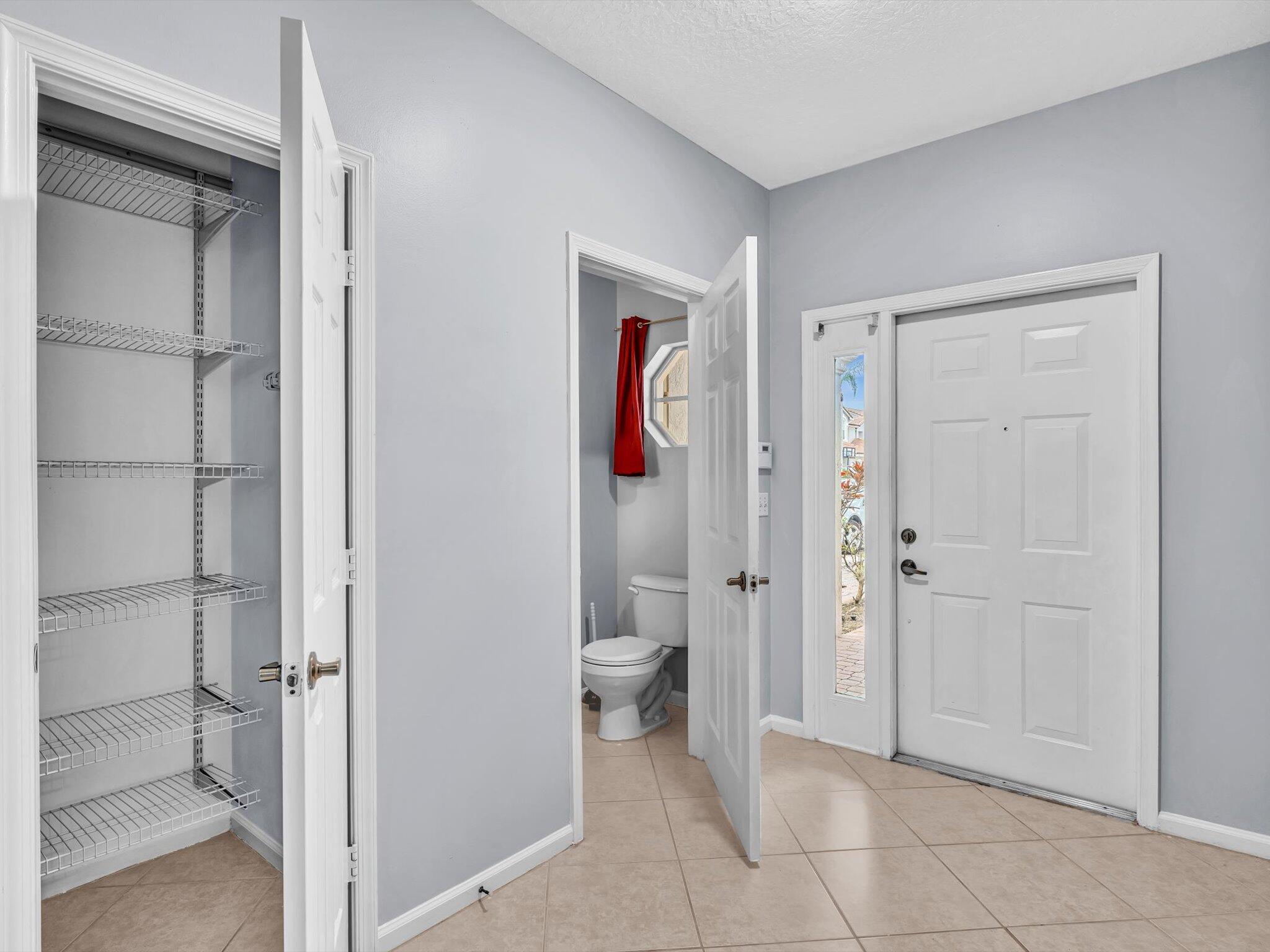 21018 Vía Eden, Unit 21018 Boca Raton, FL 33433 - Photo 14 of 63 a bathroom with a toilet