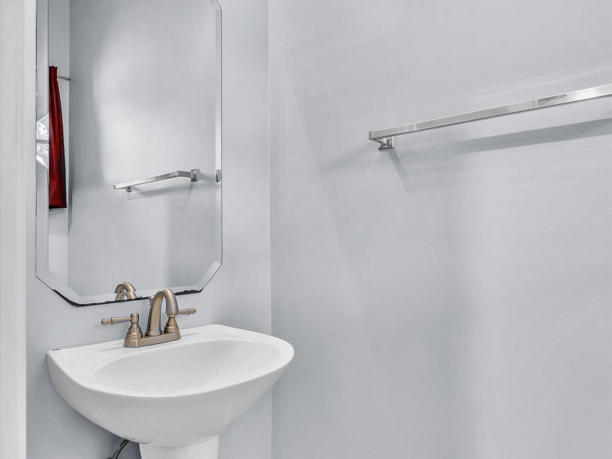 21018 Vía Eden, Unit 21018 Boca Raton, FL 33433 - Photo 15 of 63 a bathroom with a sink a mirror and shower