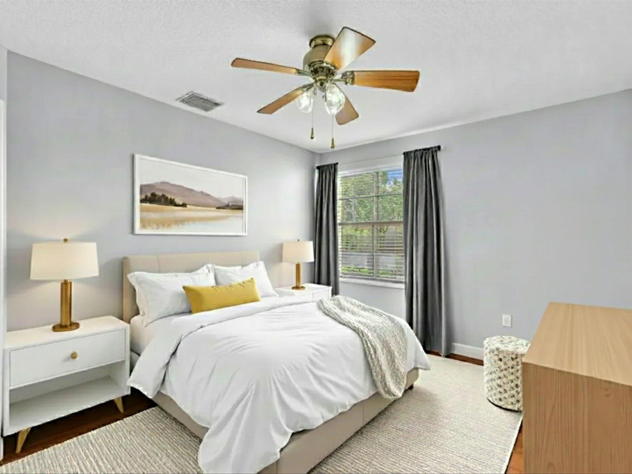 21018 Vía Eden, Unit 21018 Boca Raton, FL 33433 - Photo 20 of 63 a bedroom with a bed and a chandelier