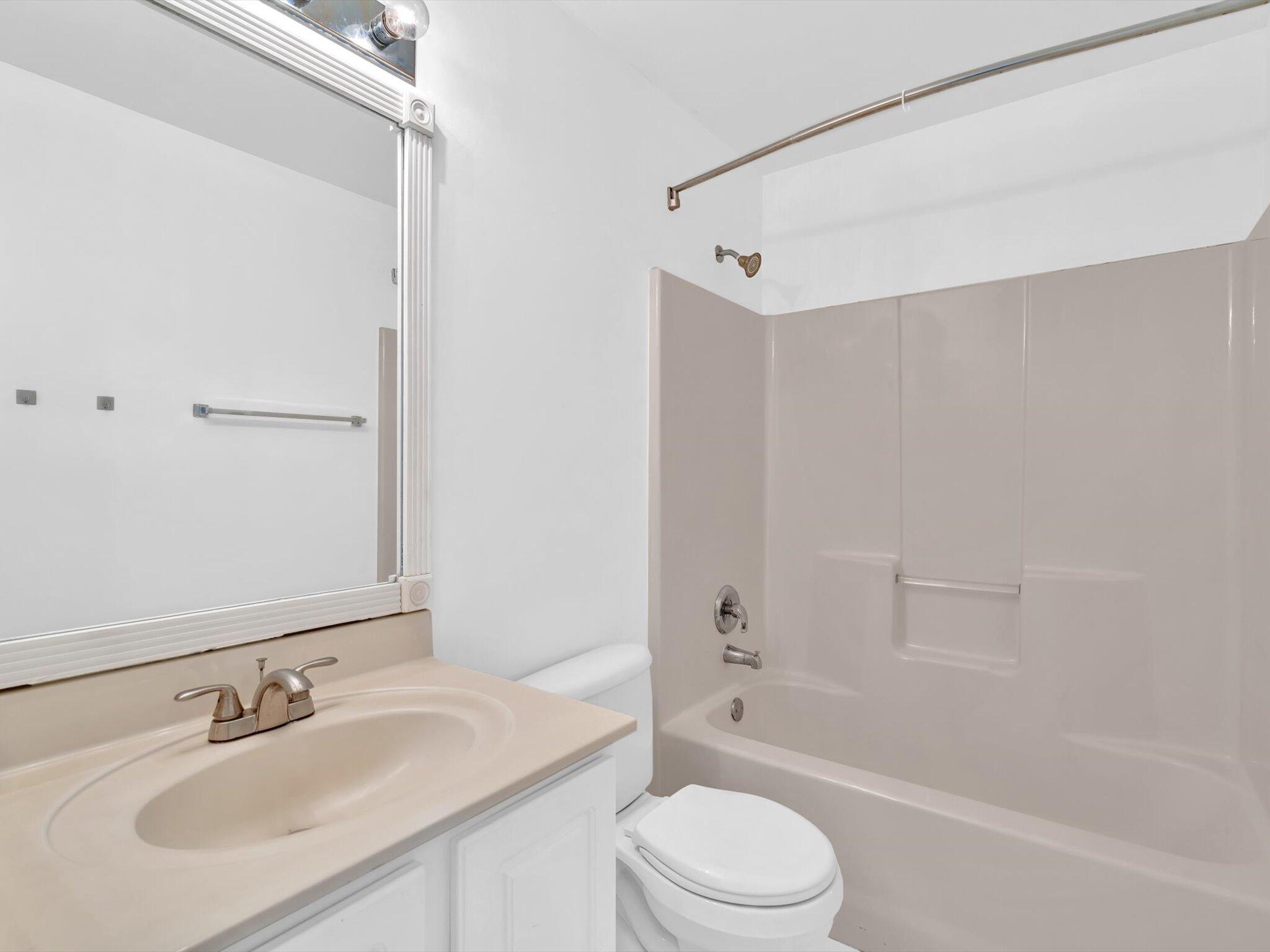 21018 Vía Eden, Unit 21018 Boca Raton, FL 33433 - Photo 25 of 63 a bathroom with a sink toilet and shower