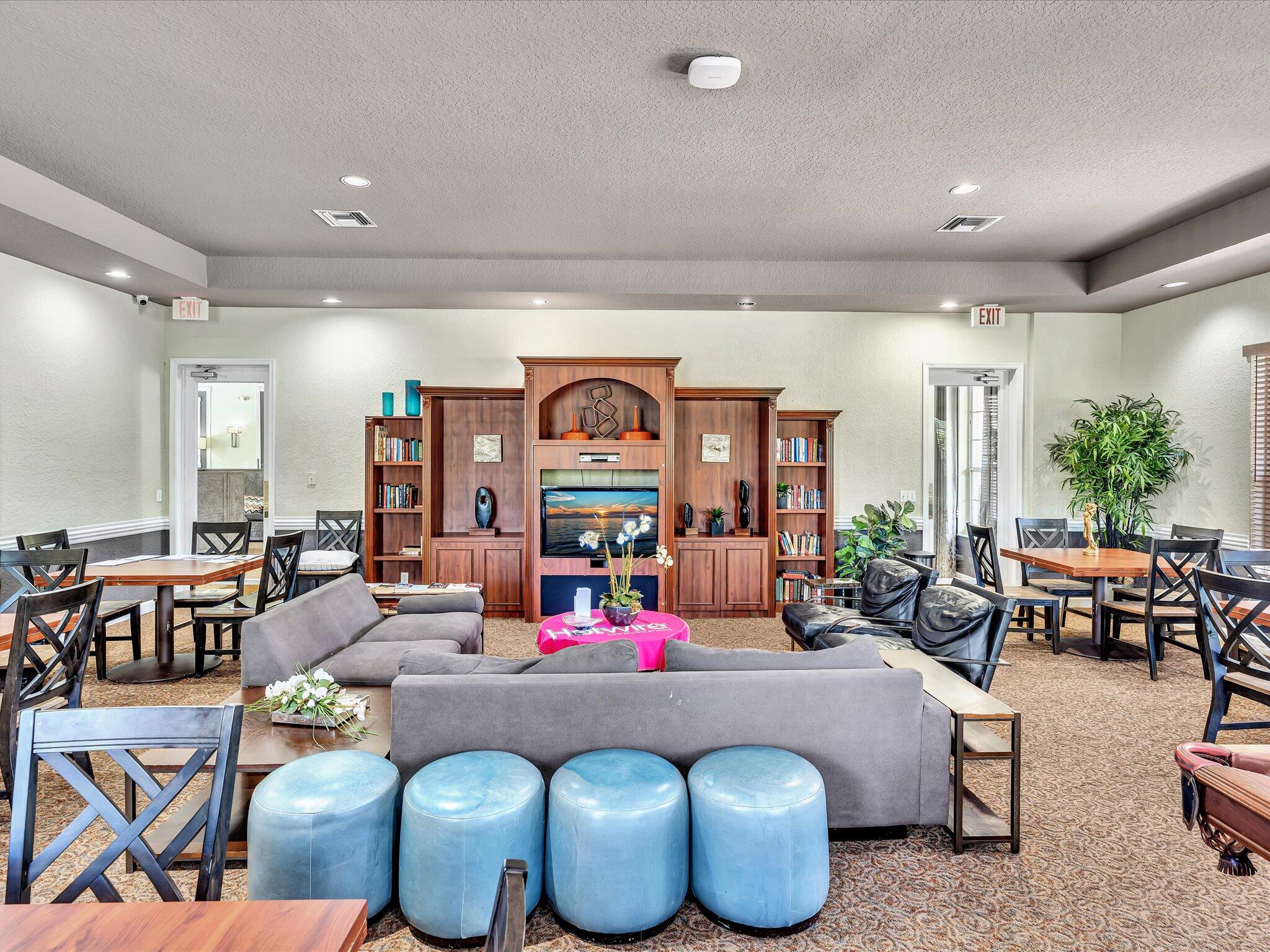 21018 Vía Eden, Unit 21018 Boca Raton, FL 33433 - Photo 41 of 63 a living room with lots of furniture and view of kitchen