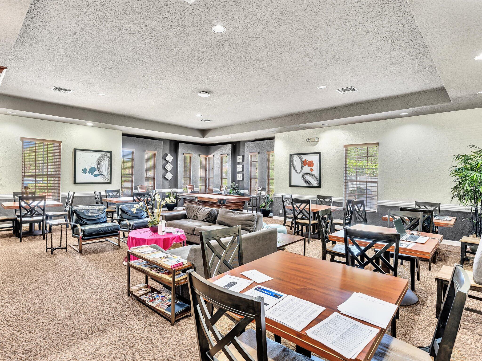 21018 Vía Eden, Unit 21018 Boca Raton, FL 33433 - Photo 43 of 63 a living room with lots of furniture a rug and a window
