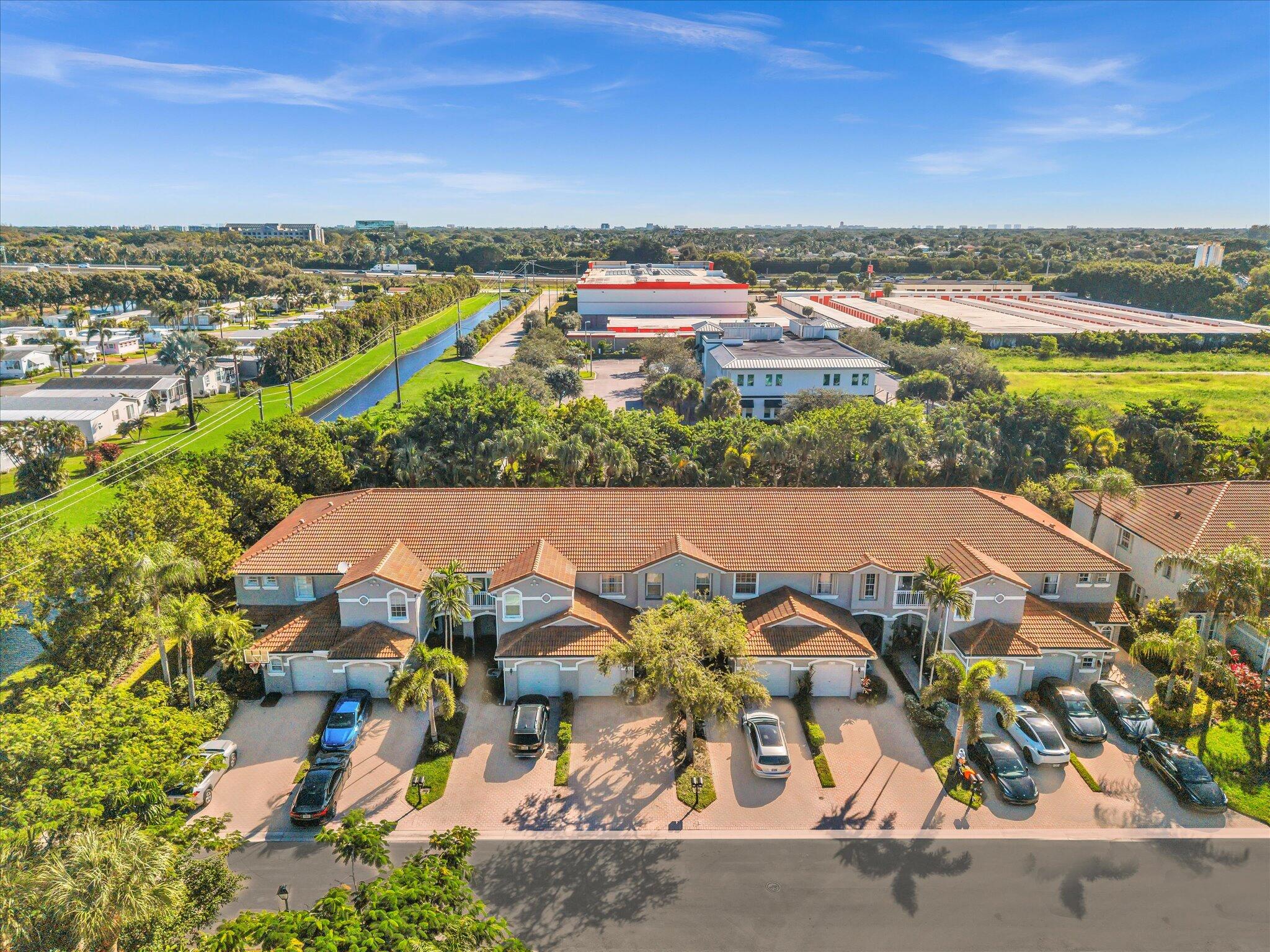 21018 Vía Eden, Unit 21018 Boca Raton, FL 33433 - Photo 60 of 63 an aerial view of residential houses with outdoor space
