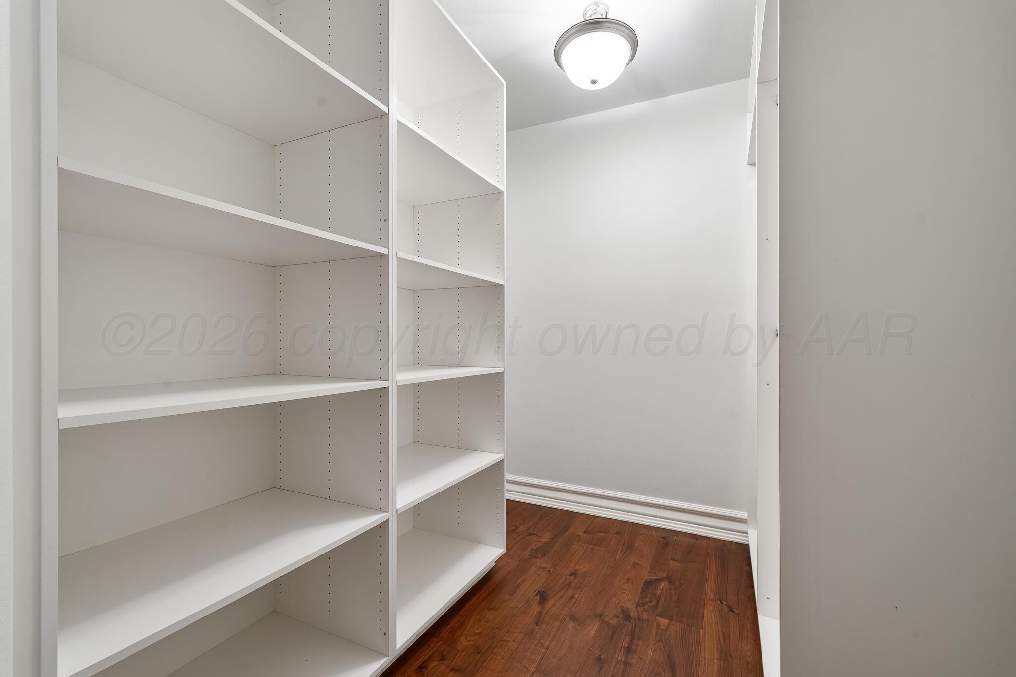 18 Cypress Point Amarillo, TX 79124 - Photo 81 of 95 a view of an empty walk in closet