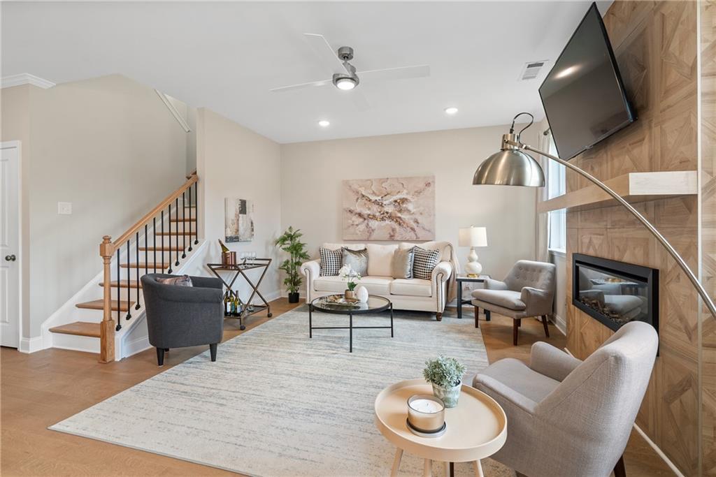112 Bridgeview (lot 4) Way Canton, GA 30114 - Photo 12 of 45 a living room with furniture and a wooden floor