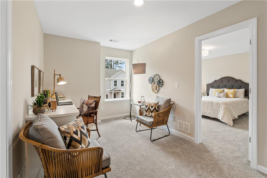 112 Bridgeview (lot 4) Way Canton, GA 30114 - Photo 23 of 45 a living room with furniture and a potted plant