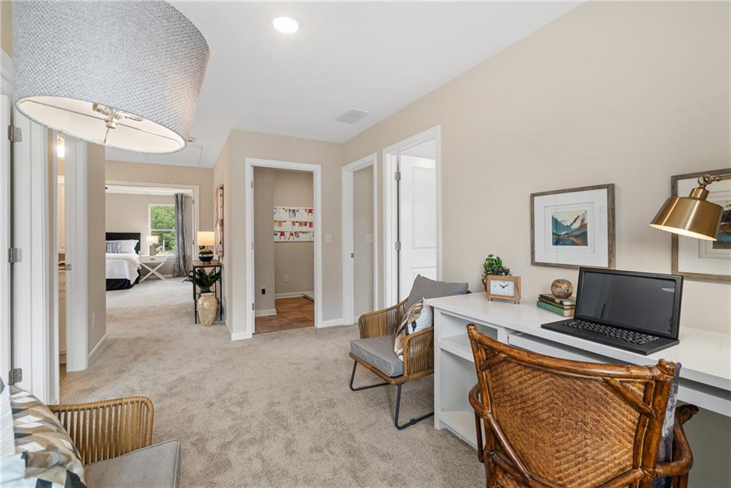 112 Bridgeview (lot 4) Way Canton, GA 30114 - Photo 24 of 45 a living room with furniture and a flat screen tv