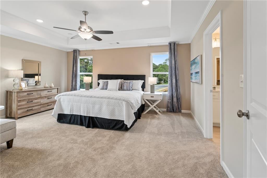 112 Bridgeview (lot 4) Way Canton, GA 30114 - Photo 25 of 45 a spacious bedroom with a bed a window and closet